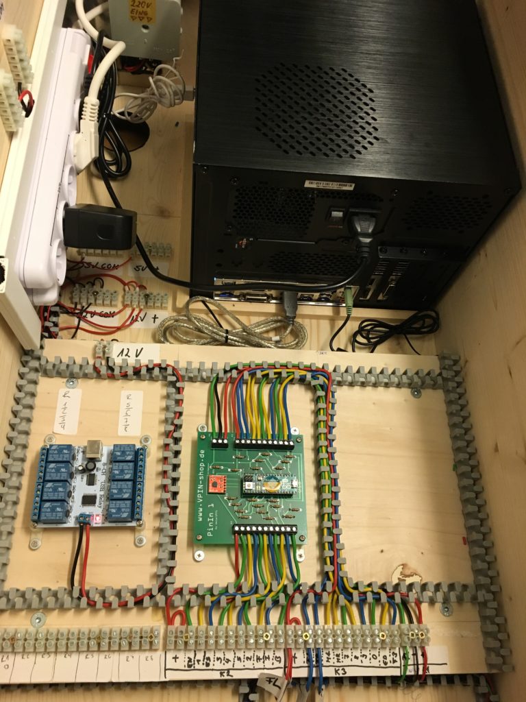 The PC was fixed with a wooden frame in the Cabinet.